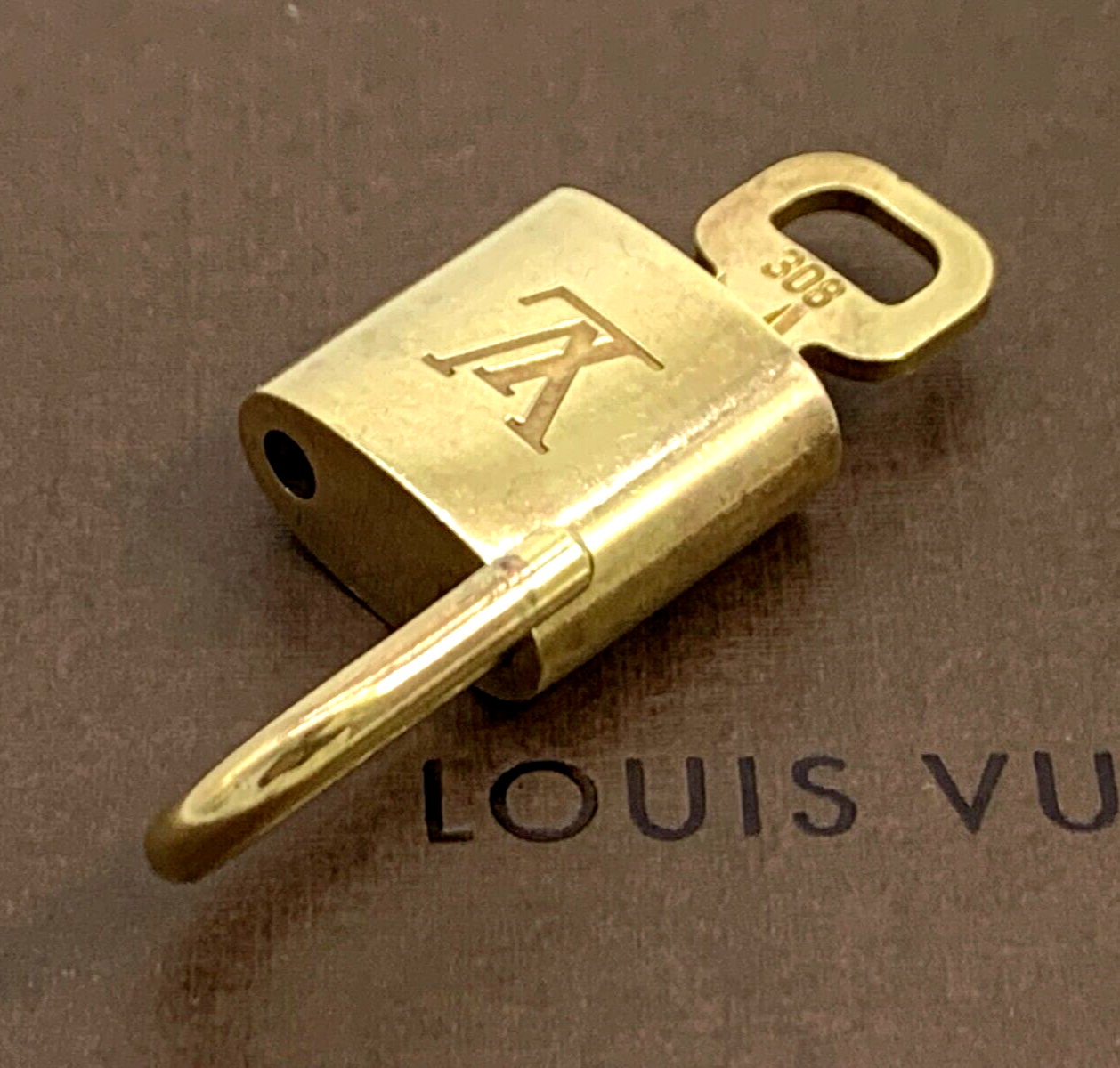 Louis Vuitton Lock & Key Padlock Brass Gold Number Random Bag Charm Authentic