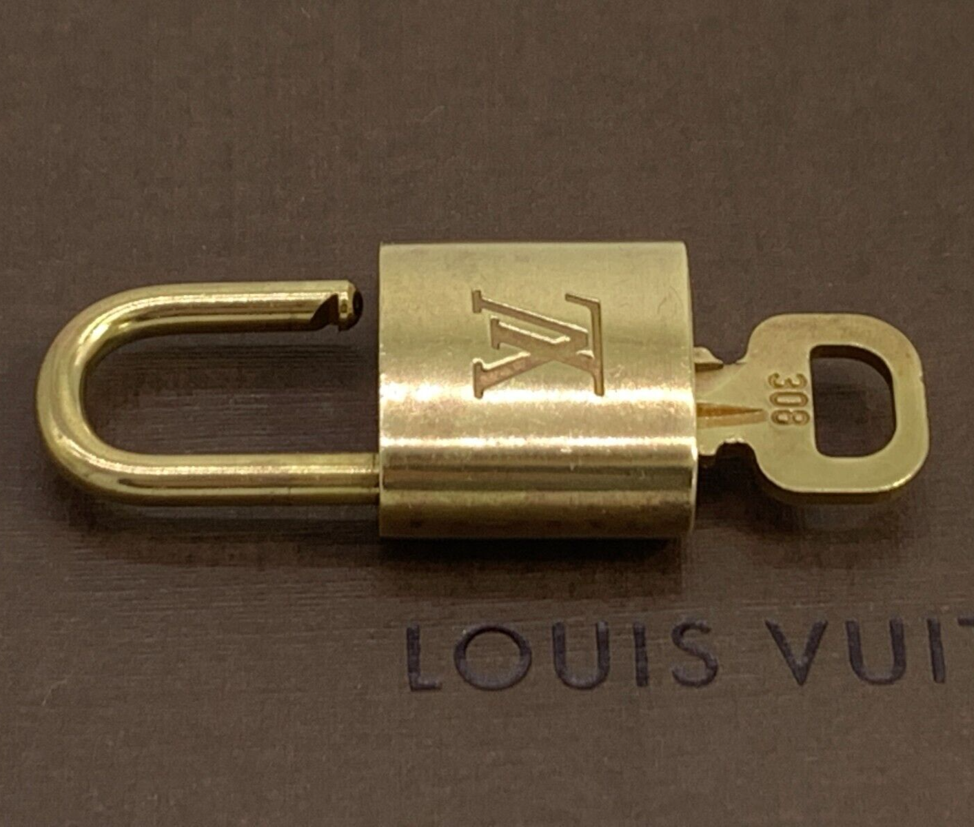 Louis Vuitton Lock & Key Padlock Brass Gold Number Random Bag Charm Authentic