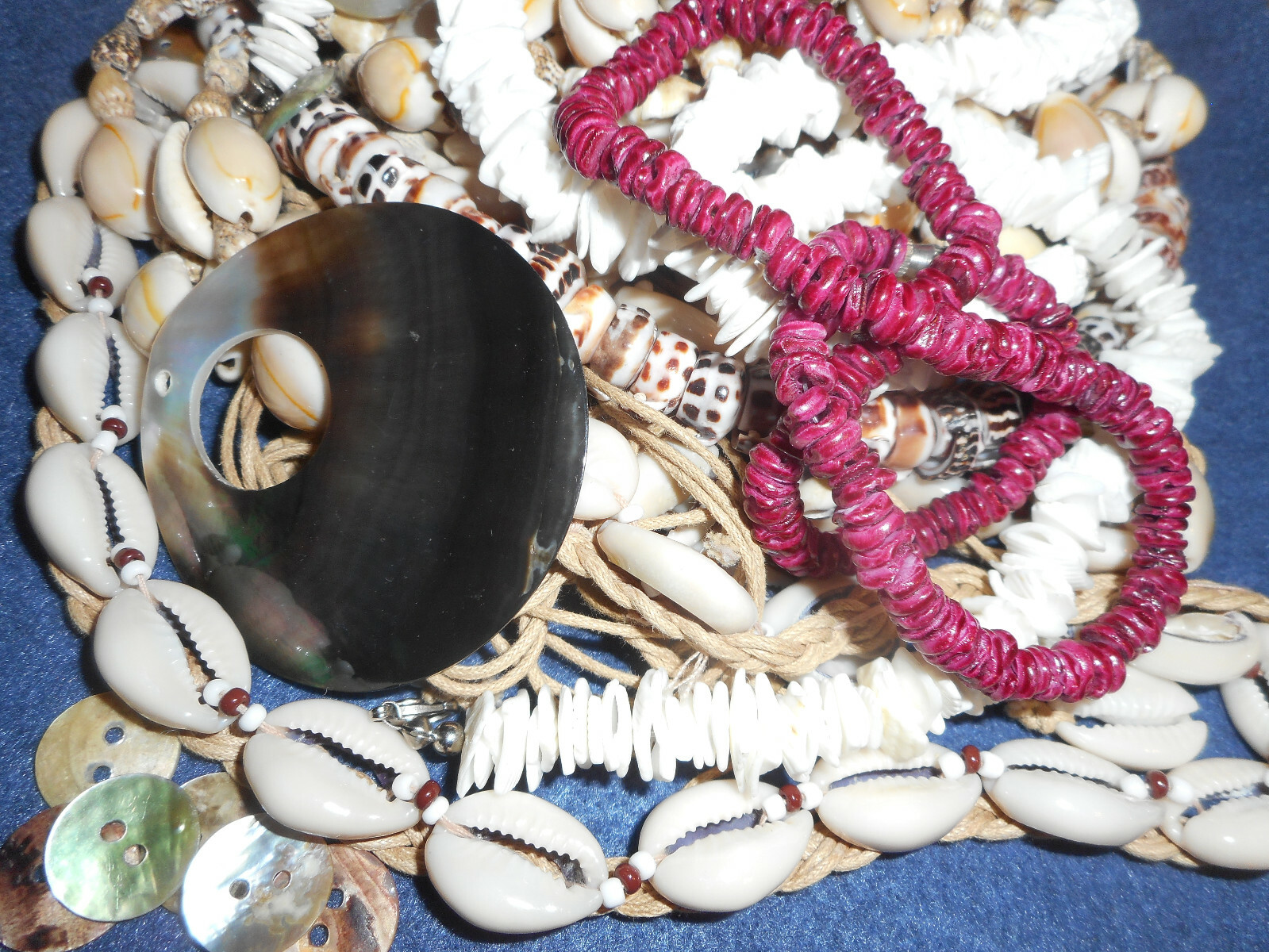SEASHELL BEACH JEWELRY 1 POUND OF COWRIE, PUKA SURFER, ABALONE, SHELL LEIS, ETC.