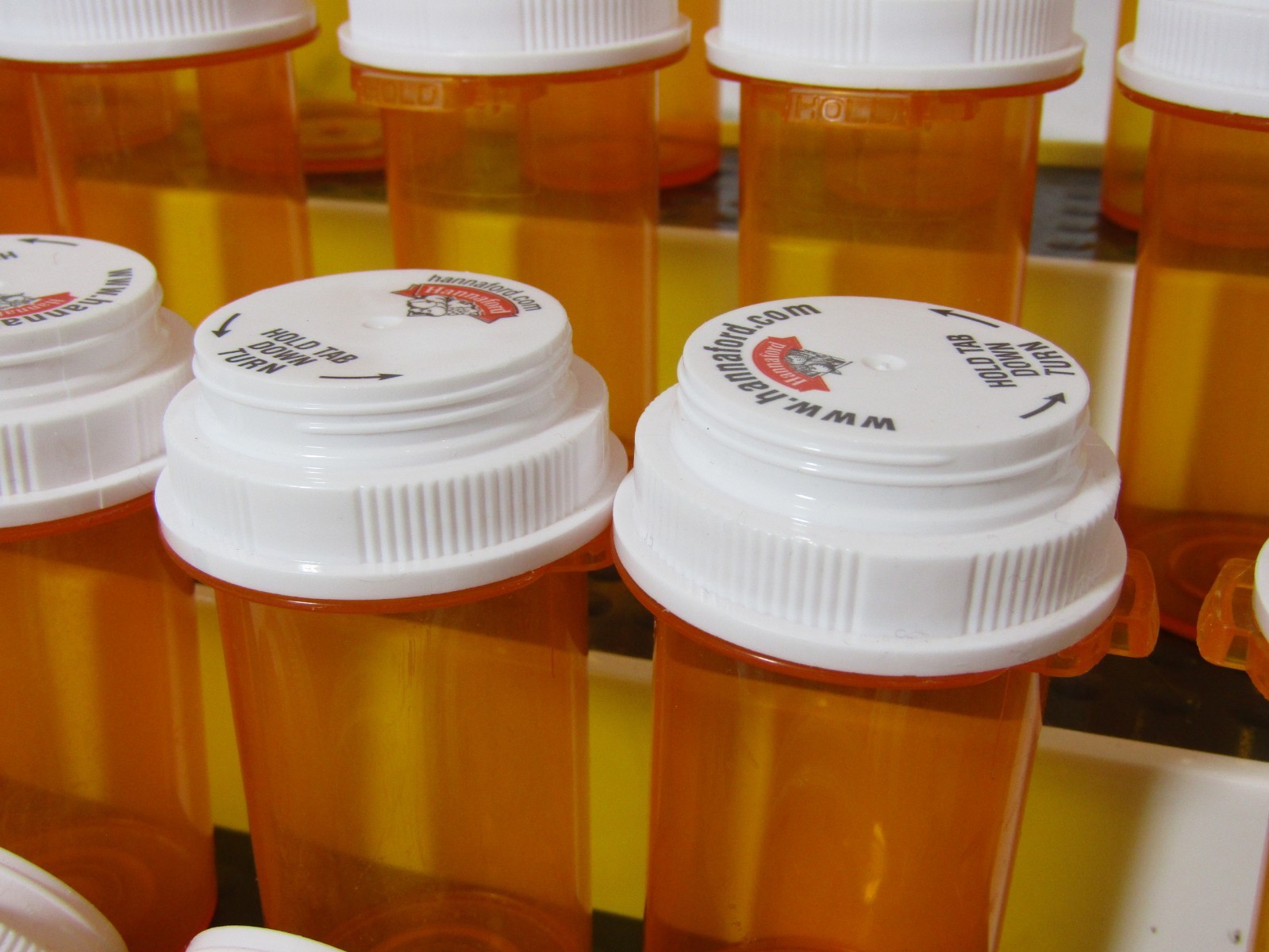 used 24 empty amber pill bottles, assorted sizes, clean, good for storage