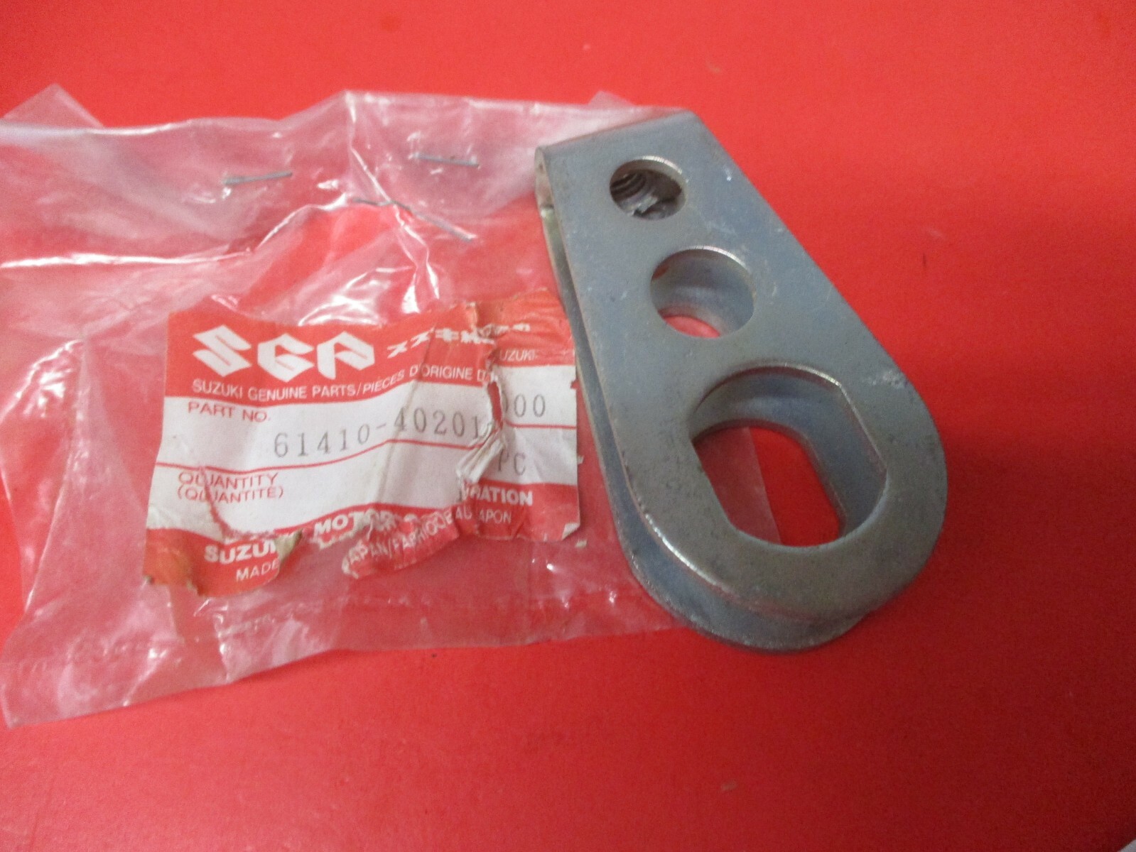 T NOS OEM NEW ORIGINAL SUZUKI CHAIN ADJUSTER RM125 PE175 61410