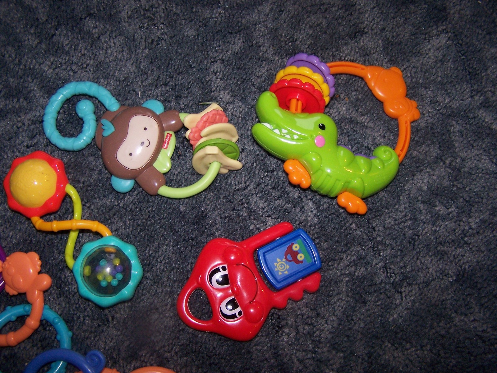 Lot of 4 Fisher Price Bright Stars Rattles Teething Rings