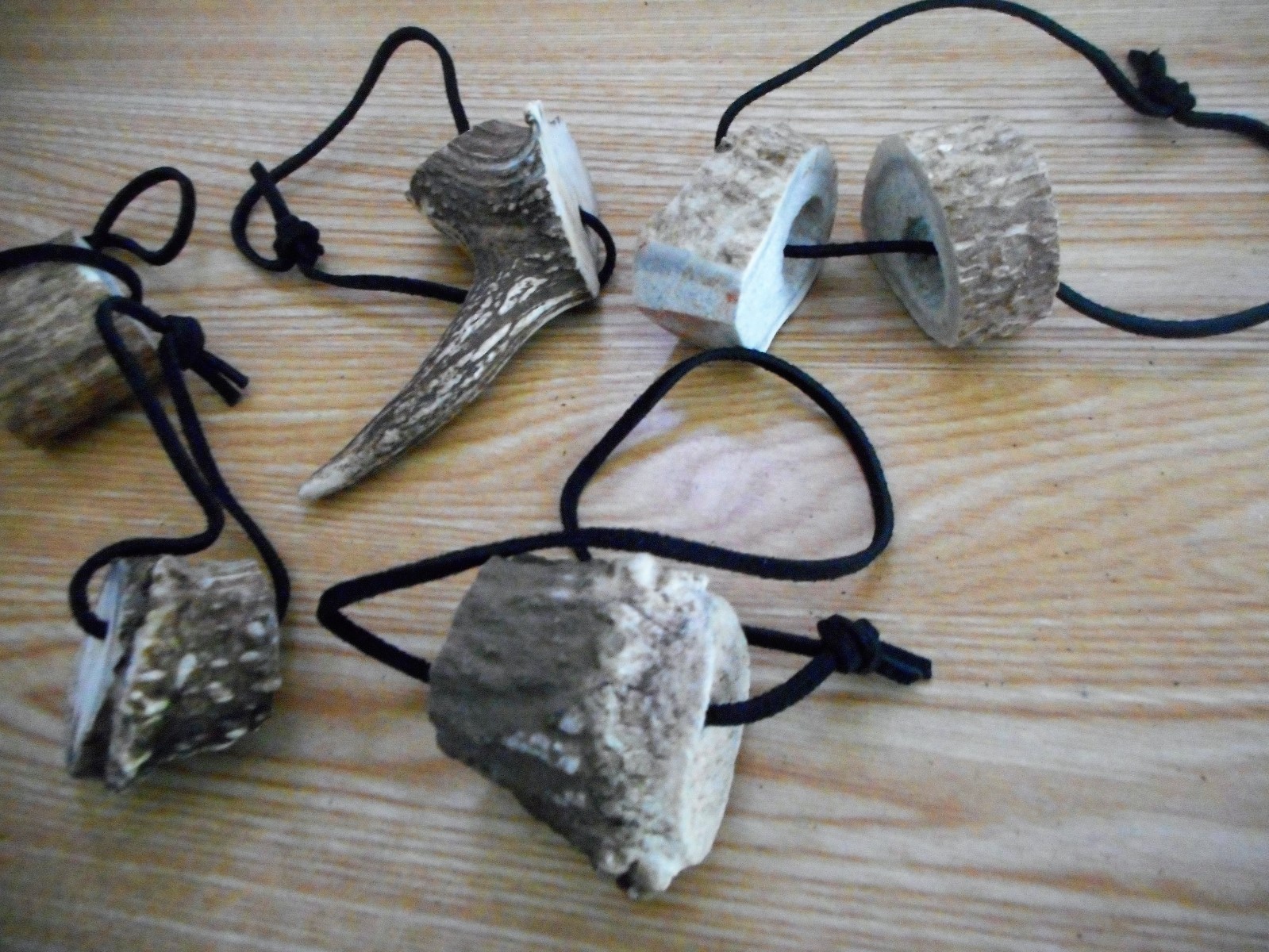 Set of 5 real deer antlers on black leather cord