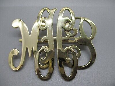 MHP monogram large Gold tone brooch pin