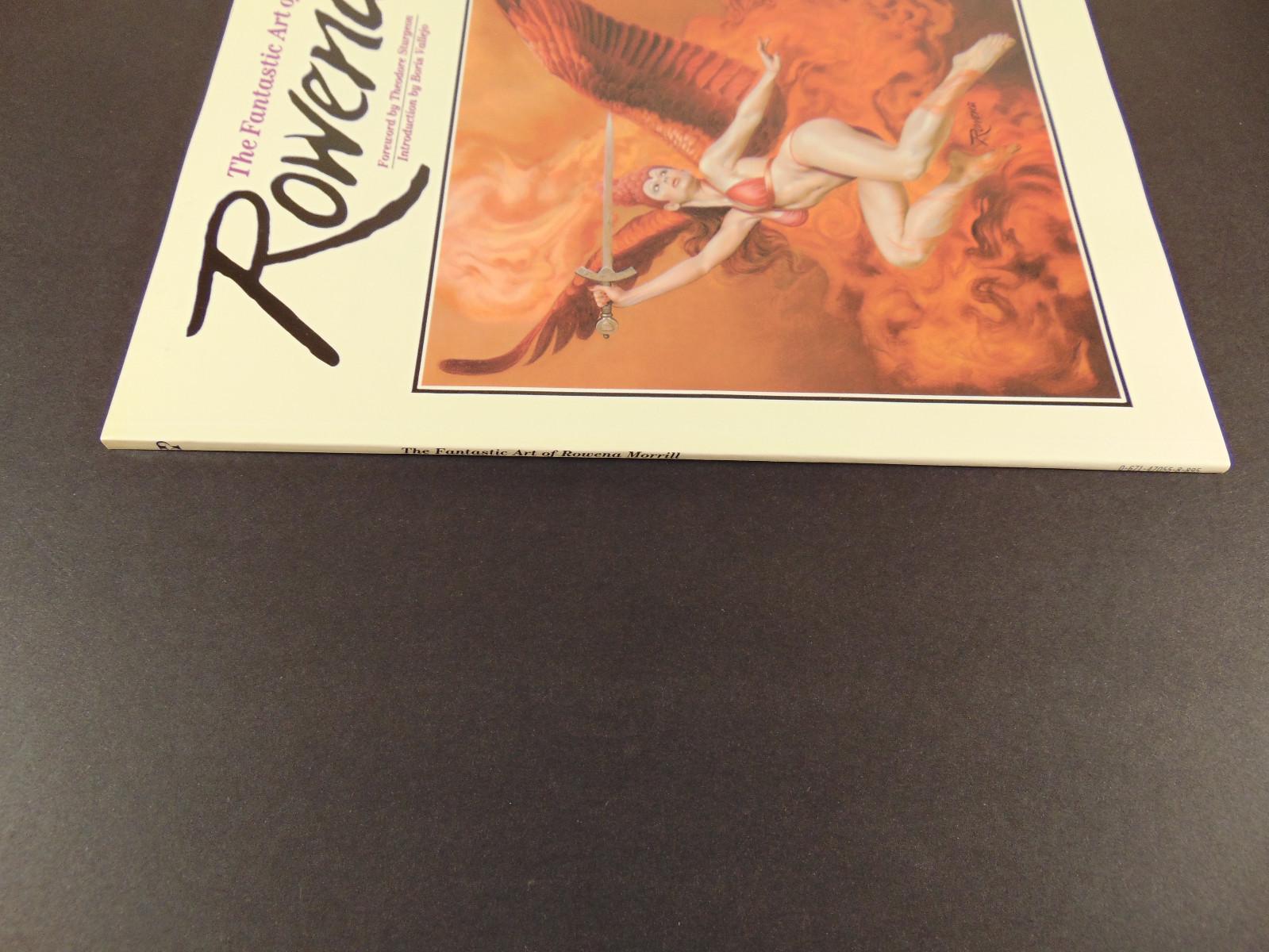 The Fantasitc Art of Rowena Morrill 1983 paperback would grade 9.4 NM or higher