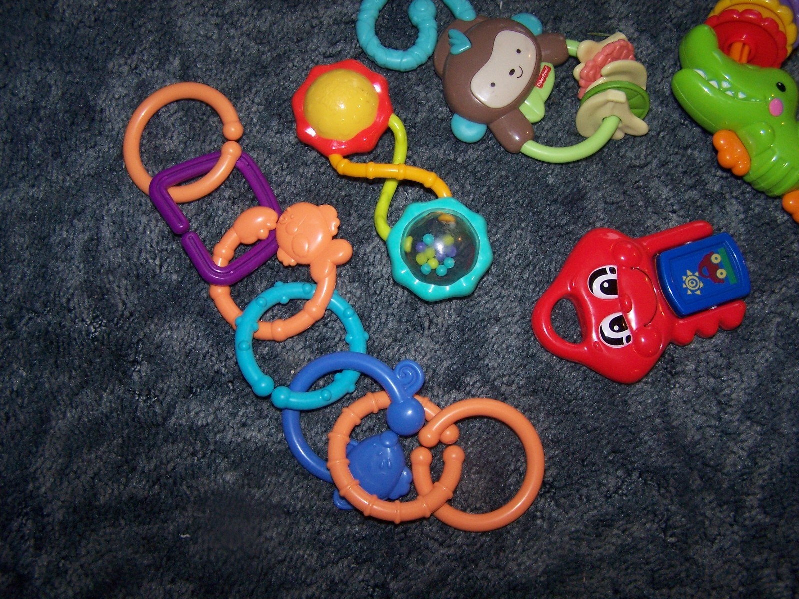 Lot of 4 Fisher Price Bright Stars Rattles Teething Rings