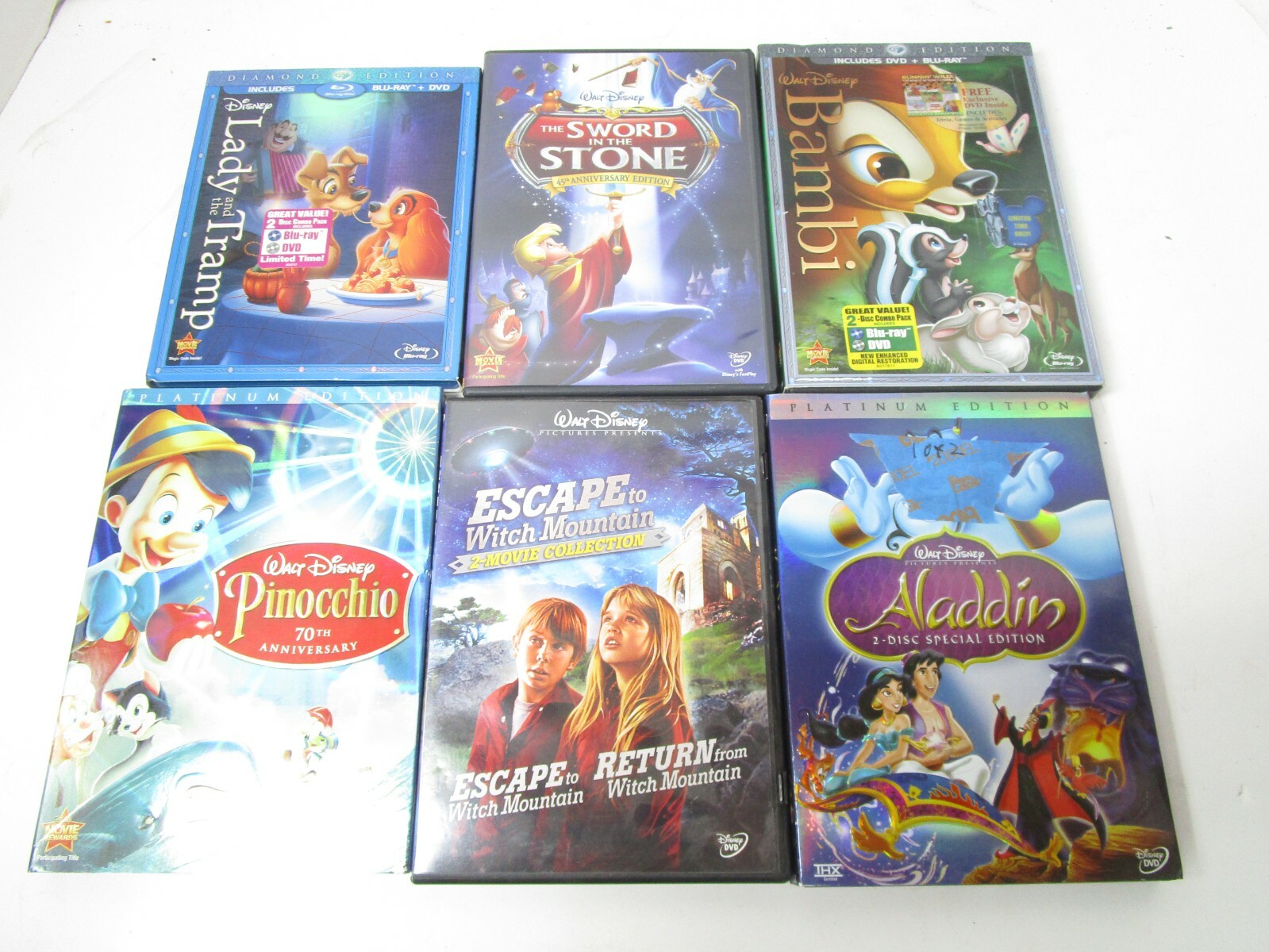 Lot of 6 Preowned DVDs BluRay Disney Sword Stone Pinocchio