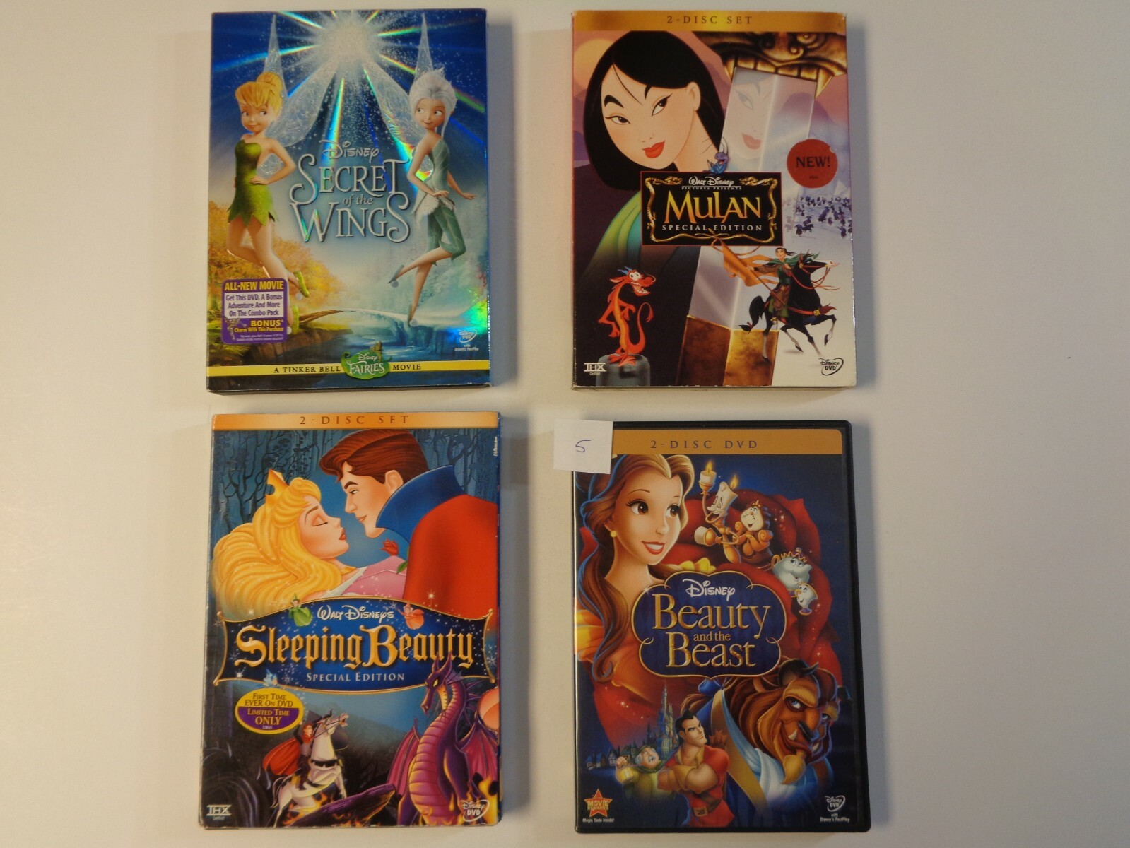 Lot of 4 DVDs, Disney Beauty and the Beast, Sleeping Beauty