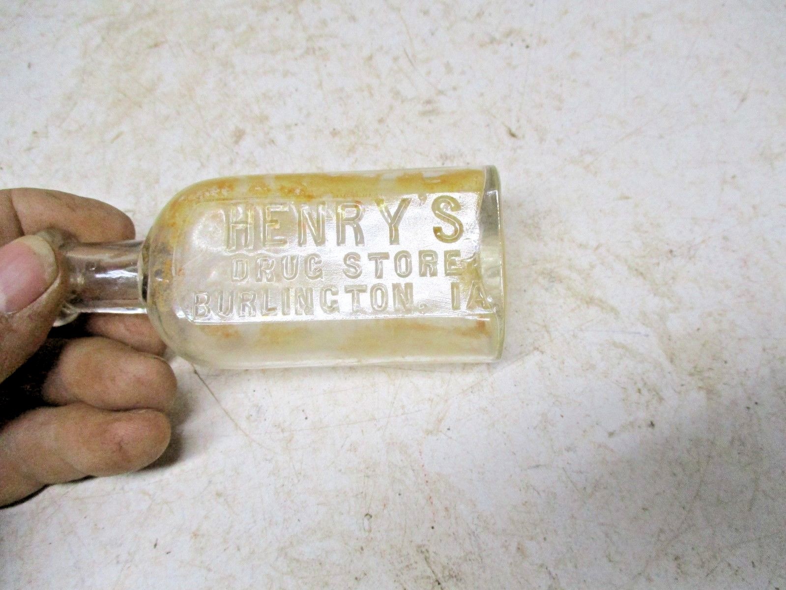Old Embossed Bottle Henry's Drug Store Burlington Iowa
