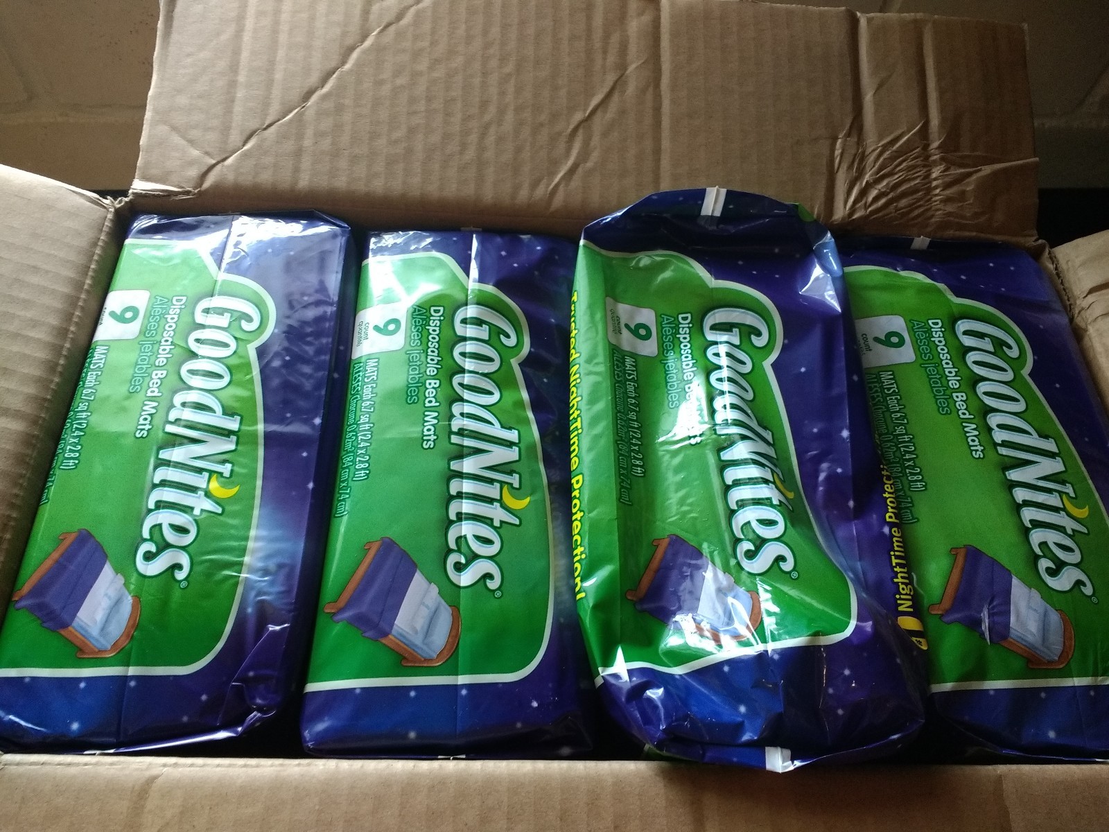 4 packs of 9 Goodnites disposable bed, crib mats Box- 36 total