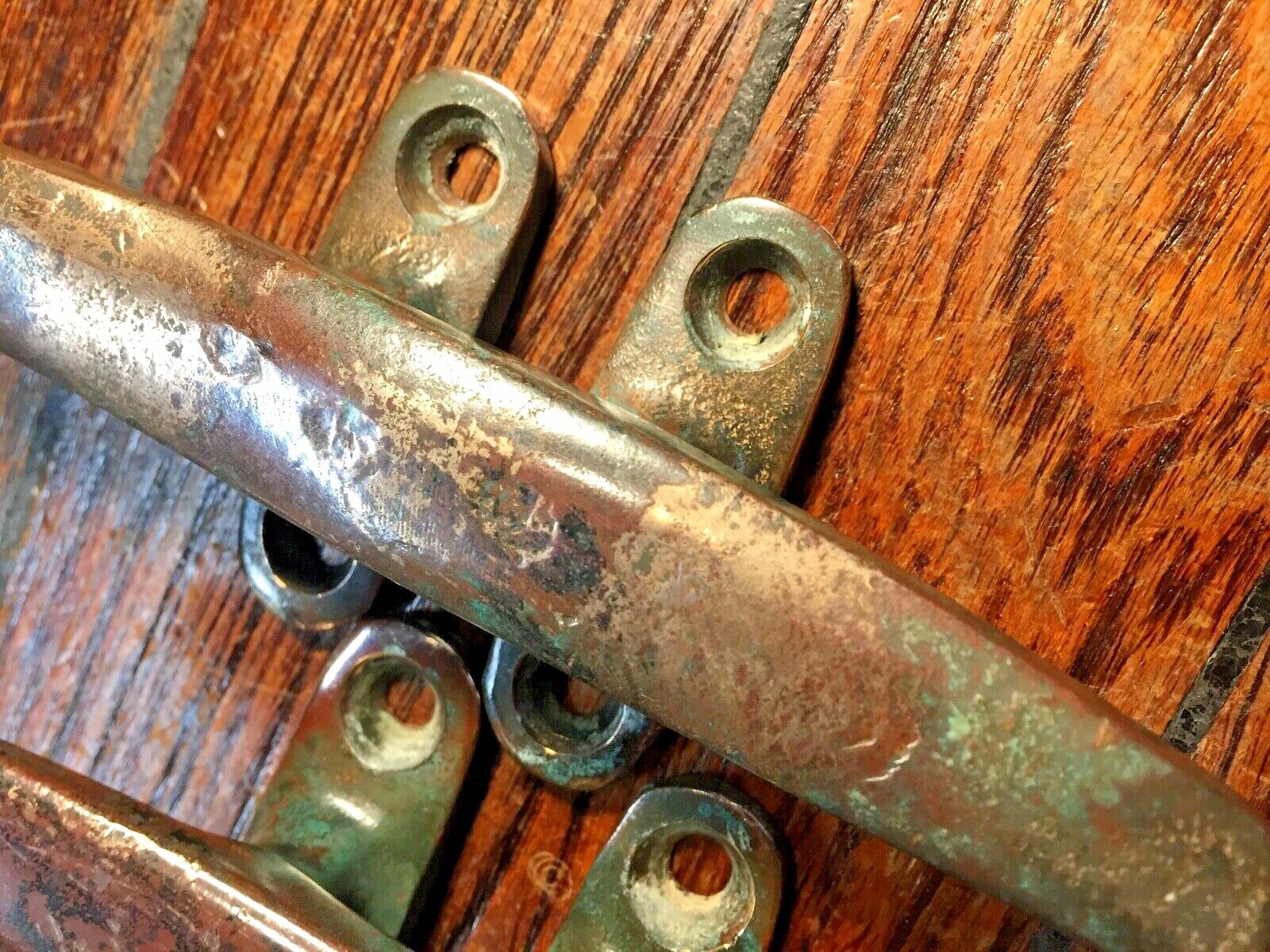 PAIR OF VINTAGE OLD SOLID BRONZE CLEATS 6