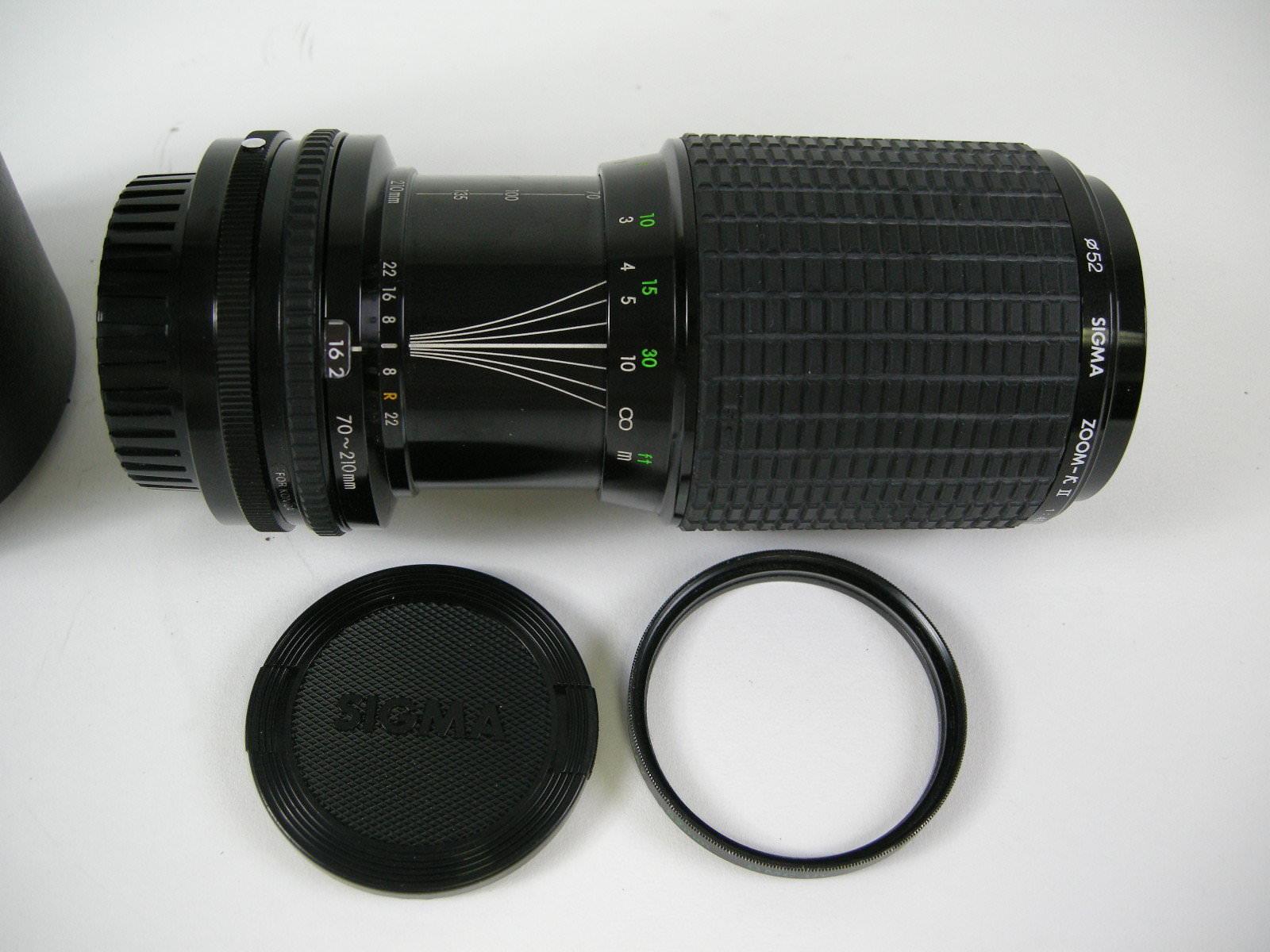 Sigma 70-210mm f4.5 Zoom K II MC Konica Mt. lens with caps, filter and case.