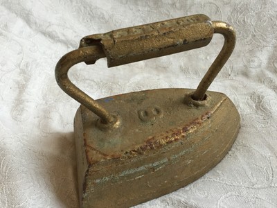 Antique Geneva? Sad Iron - 8# Goldtone HEAVY door stopper weight Gold Cast Iron