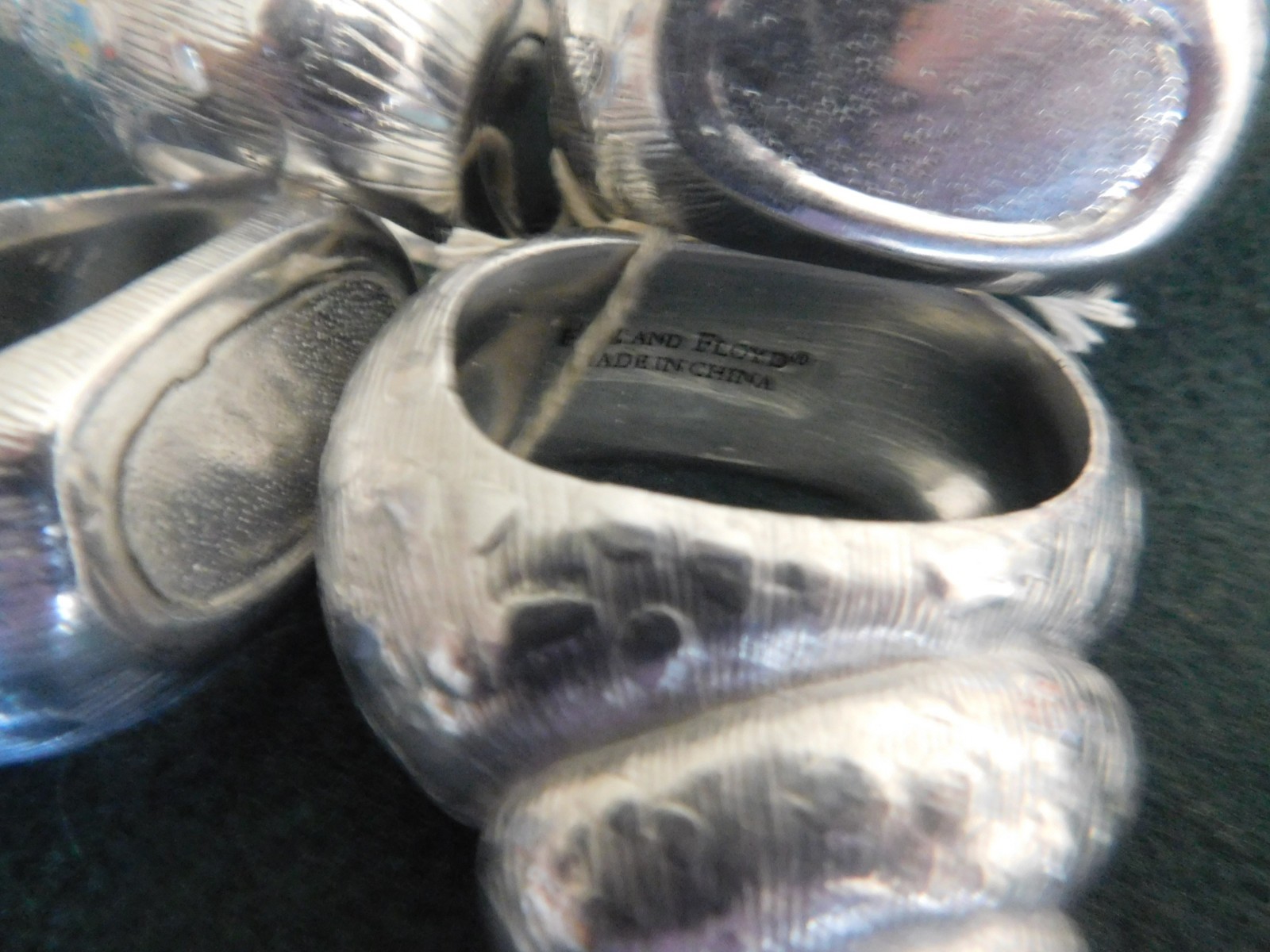 aluminum Fitz and Floyd shell shaped napkin rings 4 of them Made in China