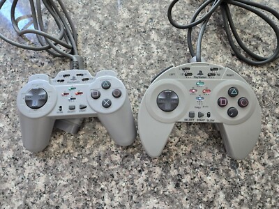 Two PlayStation PS1 ASCII controllers, working