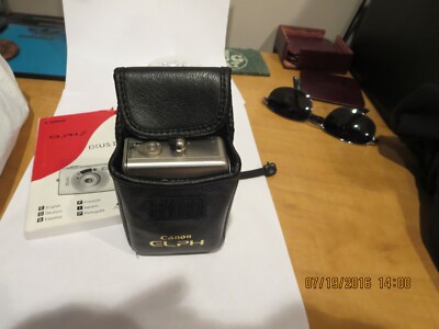 CANON ELPH @ IXUS !! IN GENUINE LEATHER CASE , 7  CARTRIGES , OPERATING MANUAL 