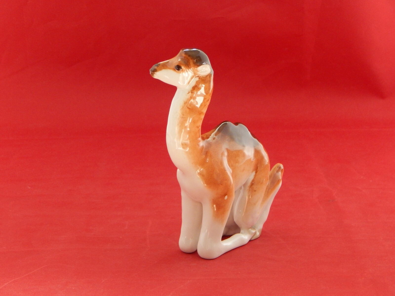 LOMONOSOV,USSR. FIGURINE OF A YOUNG CAMEL.6 1/2 INCHES TALL.