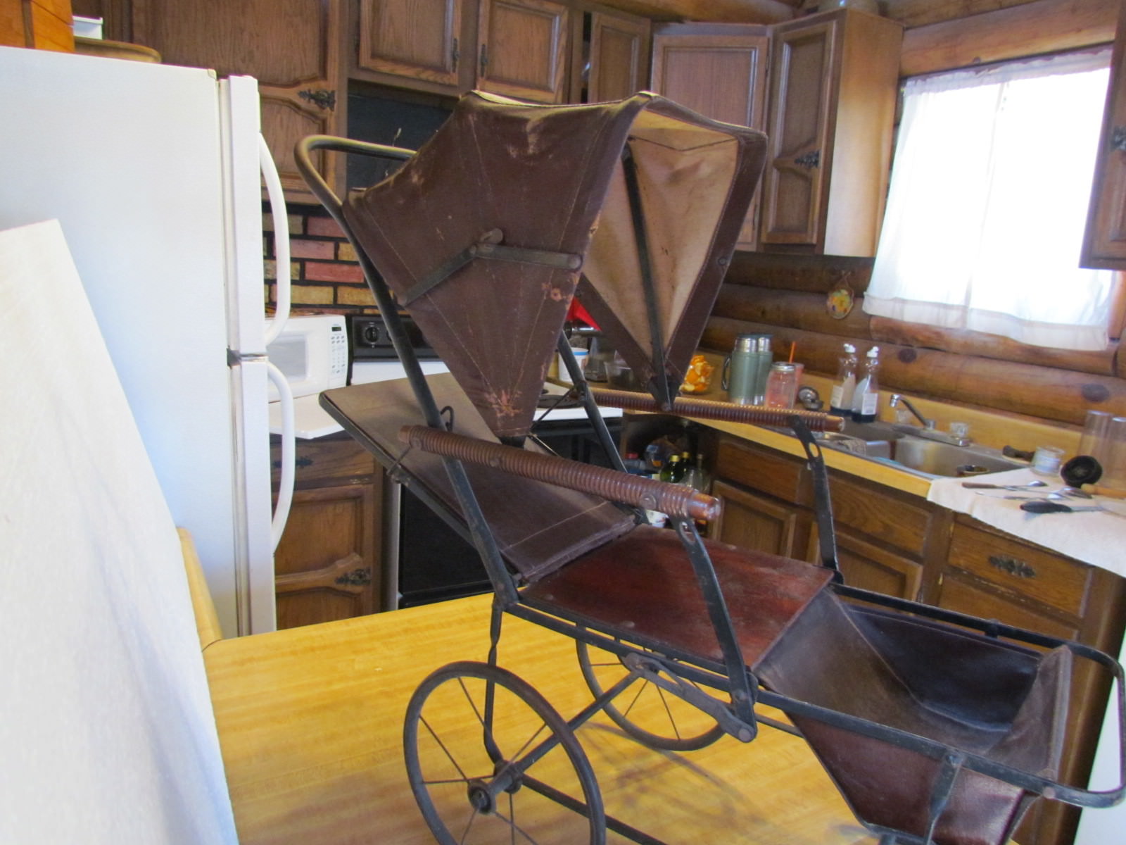 ANTIQUE DOLL BUGGY WITH FOLDING CANVAS CANOPY