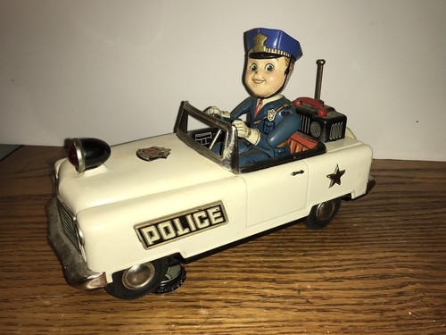 Vintage Mystery police car Japan Tinplate Battery Powered.