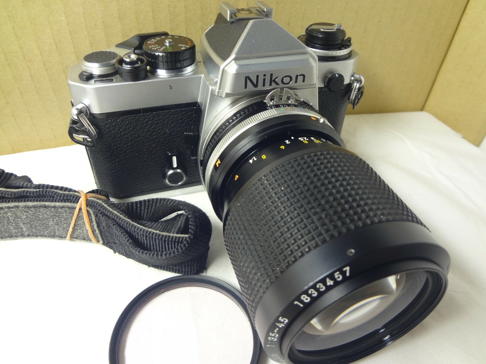 Nikon FE SLR Camera,35-105/f3.5-4.5 Ai-S,strap light seal