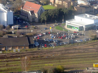 Photo 12x8 The other side of the tracks? Lidl and Marks & Spencer seen acr c2017