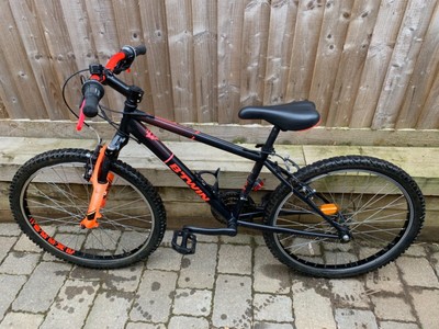 Btwin Rockrider 500 Mountain Bike Black/Orange in a great condition 