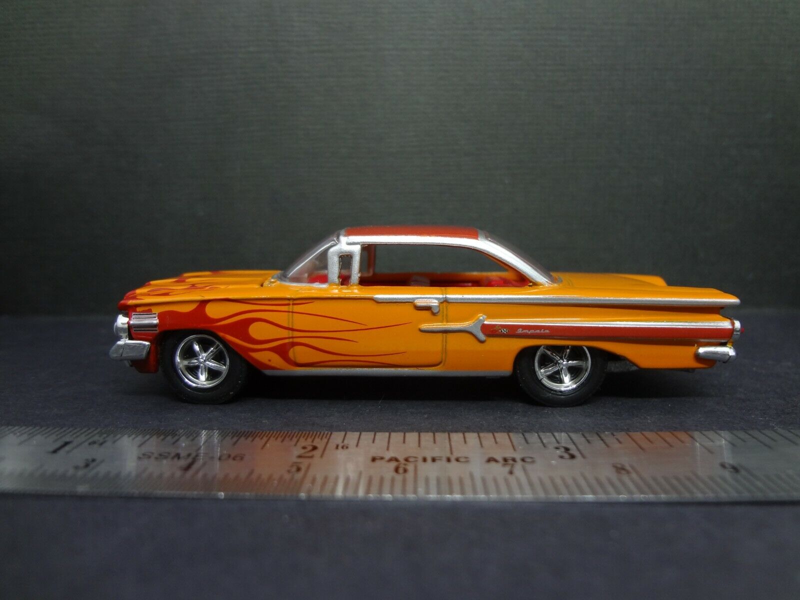 Racing Champions Mint 1960 Chevrolet Impala orange w/ flames Racing Champions Mint 1960 Chevrolet Impala orange w/ flames