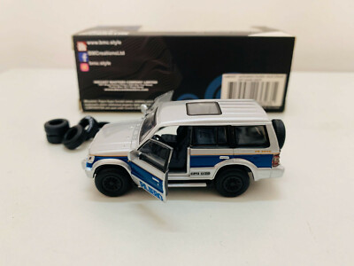 BM Creations Junior Mitsubishi Pajero Blue Stripe (LHD) 1:64