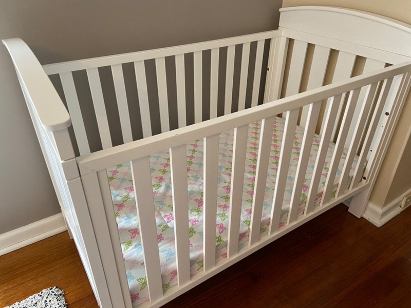 baby cot with nappy changer