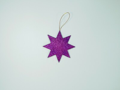 Adornos Navideños. Purpurina Morada. Estrella de 8 puntas.