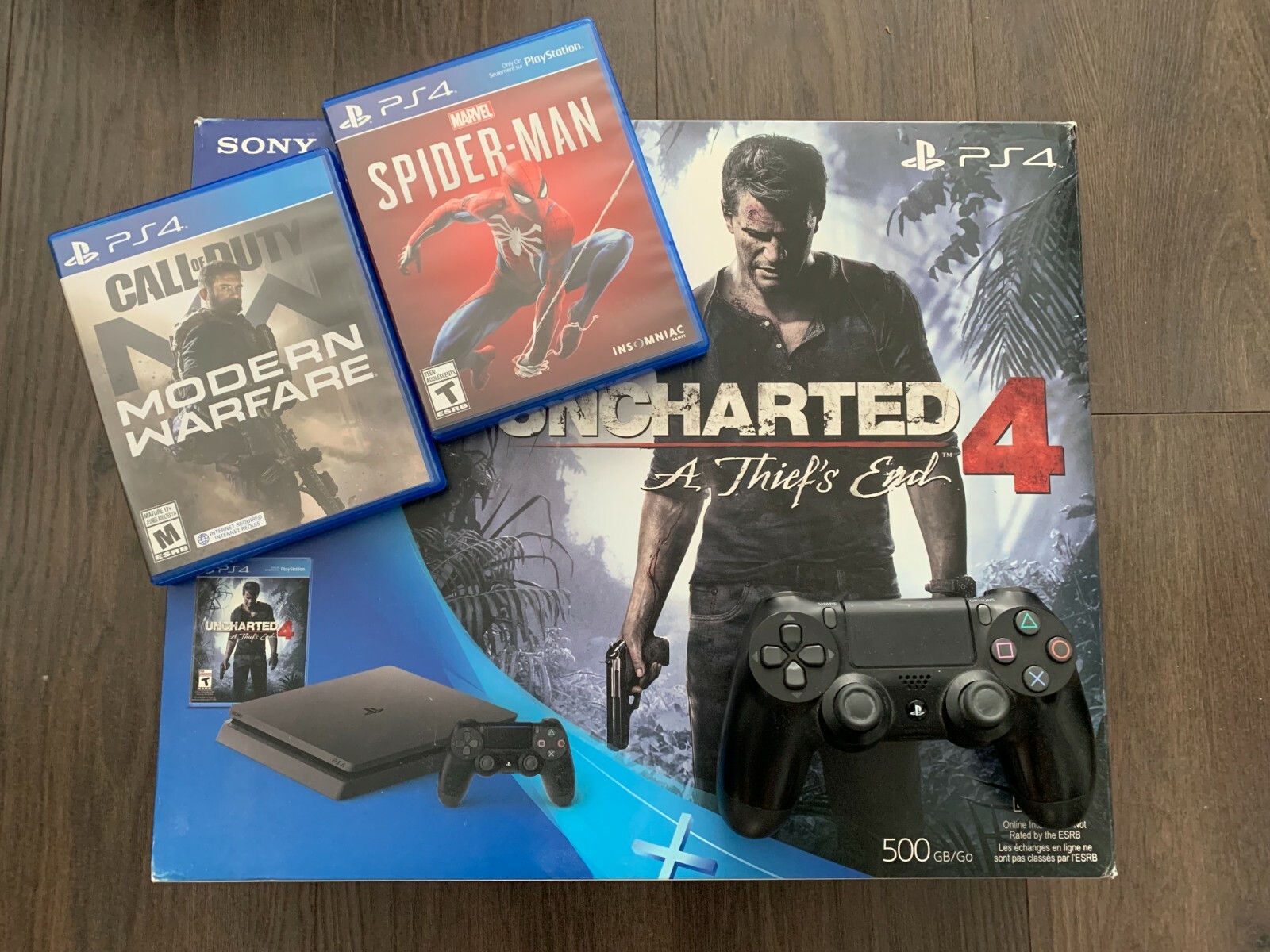 PS4 Slim　500GB Sony PlayStation 4 Slim System, 500GB, Black with Four Disc
