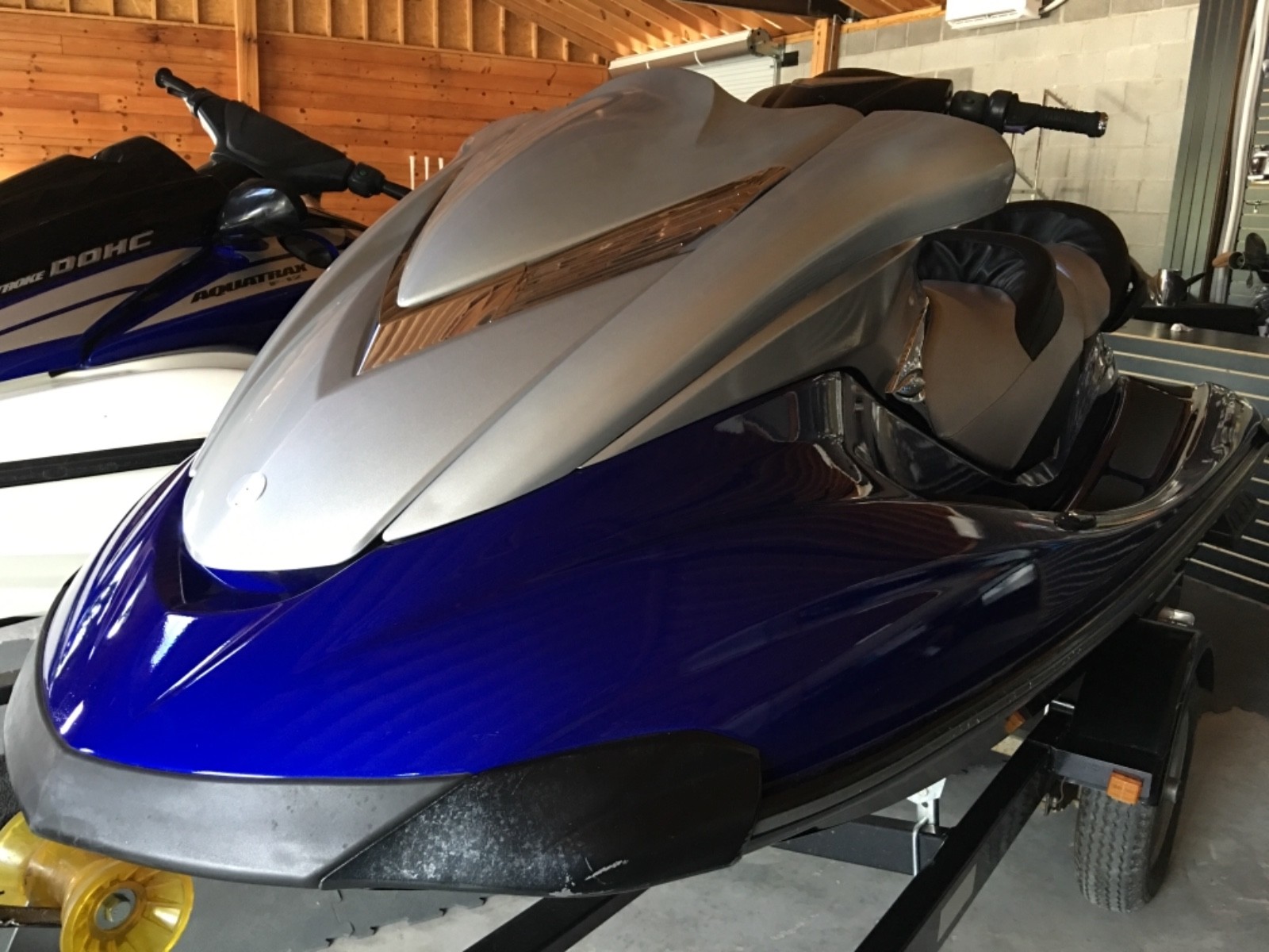 Yamaha and Honda Jet ski pair on a double trailer