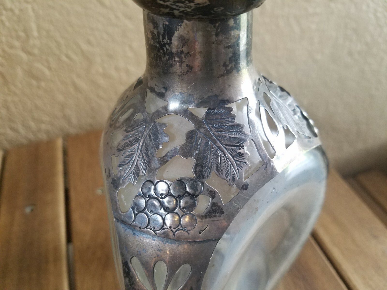 Sterling silver overlay on collectible Hague pinch side decanter
