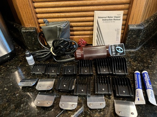 Oster Classic 76 Electric Clippers with 7 Blades and 10 Combs, Oils, Bag & Brush