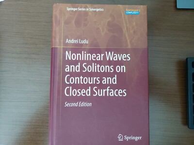 Nonlinear Waves and Solitons on Contours and Closed Surfaces by Andrei Ludu