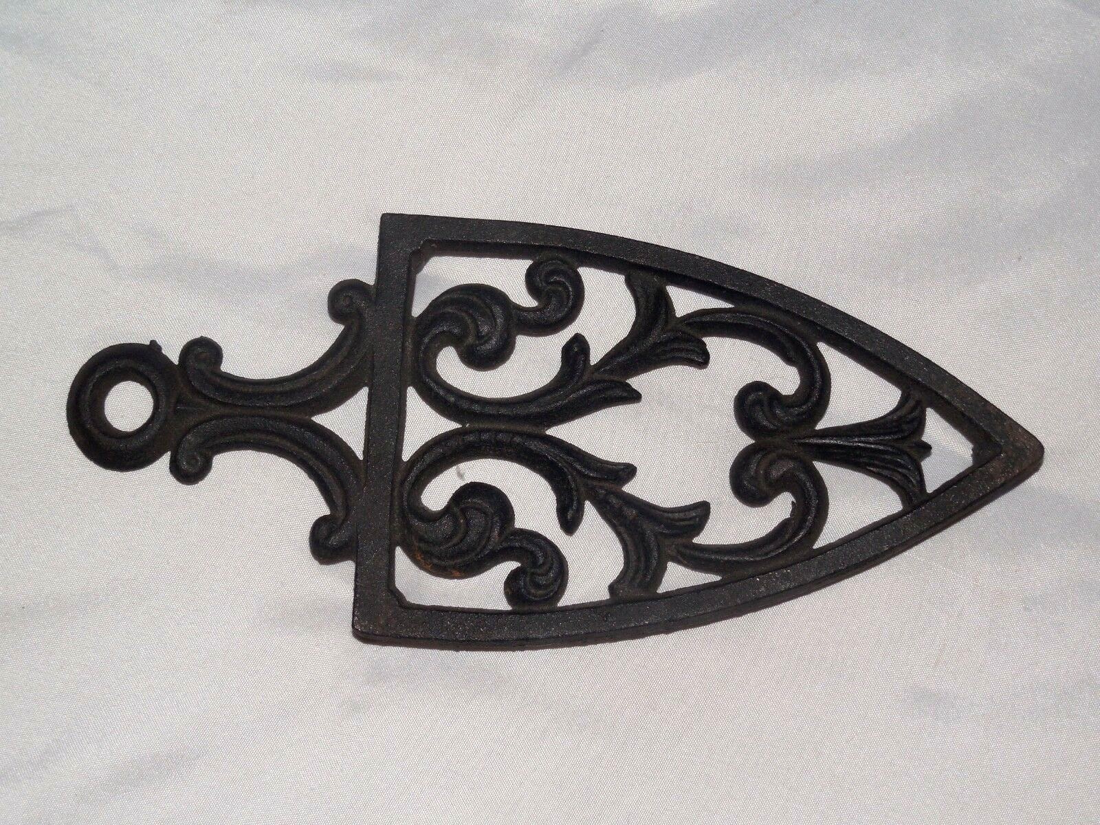 TWO PRE-OWNED BLACK CAST IRON  KITCHEN TRIVETS