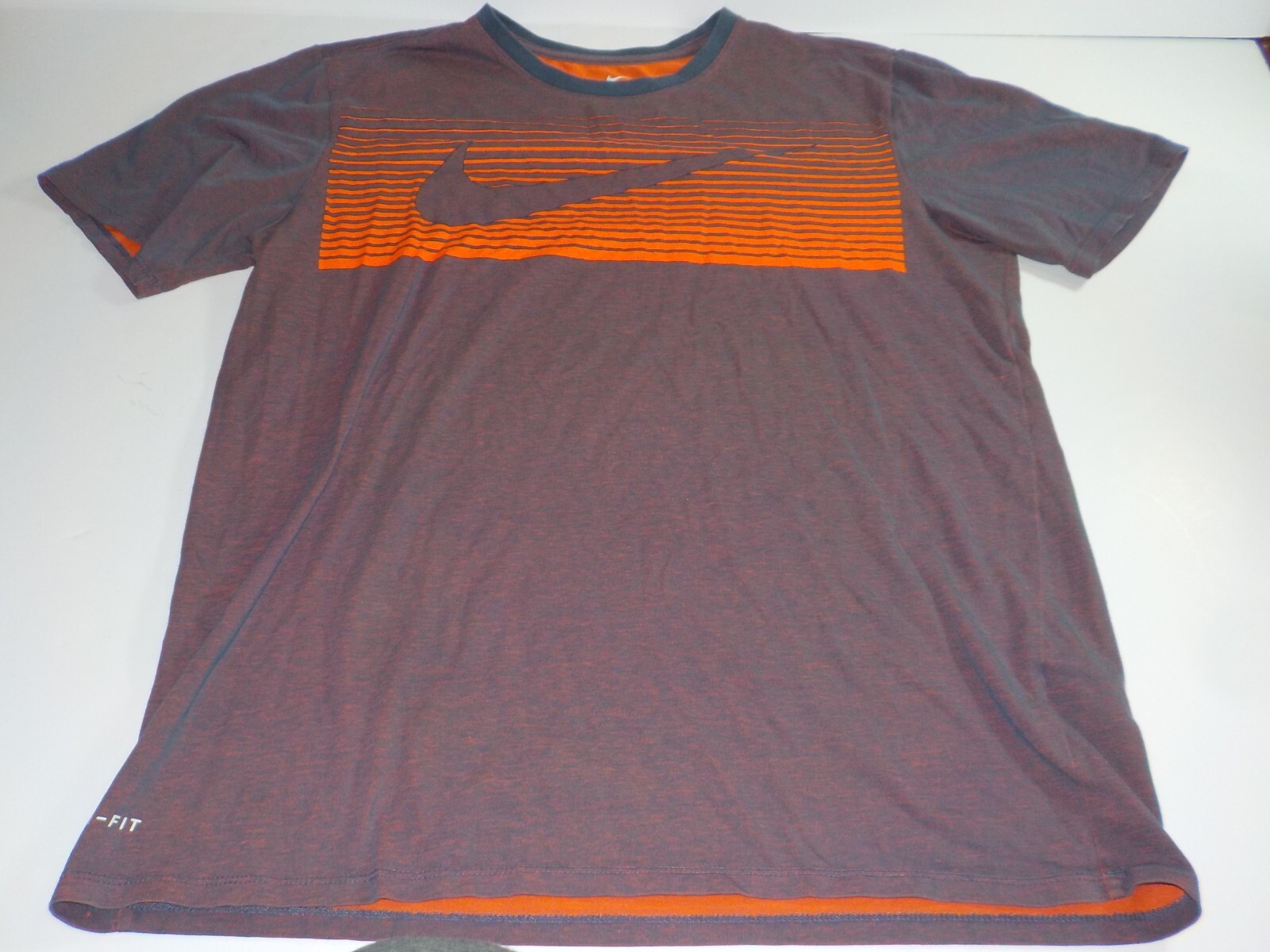 purple and orange nike shirt