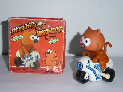 Entrechats - Wind-up Isidore sur sa moto BANDAI - MIB (Ref C387)