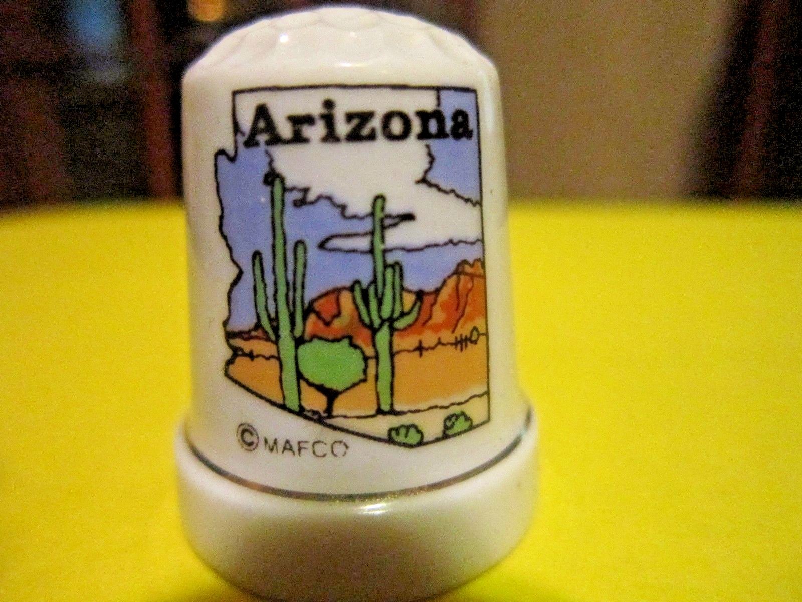 Set of Five Collectible and Souvenir Porcelain Thimbles