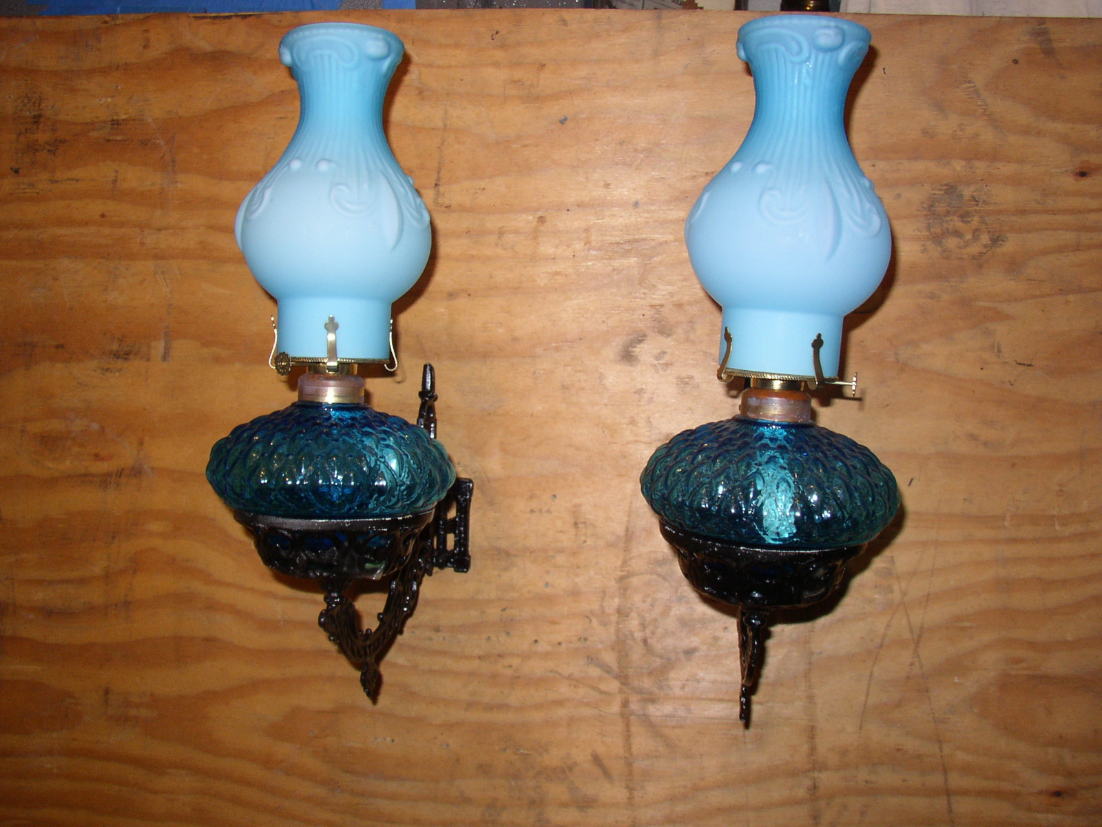 Pair Cast iron wall mount holder (sconce) with oil lamps