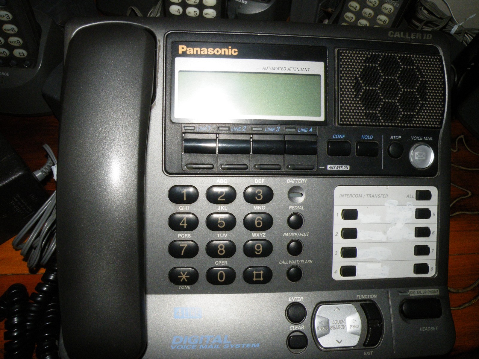 Panasonic Model KX-TG4000B Base and 7 Handsets with Chargers Read Below