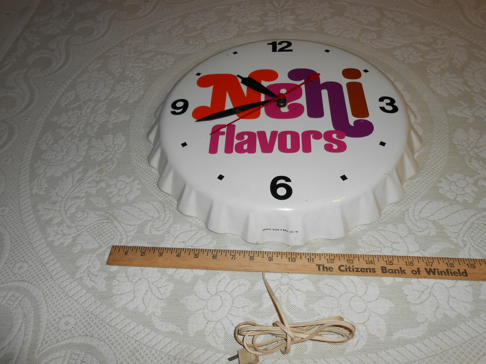 VINTAGE ORIGINAL 195O's NEHI SODA FLAVORS BOTTLE CAP TIN ADVERTISING CLOCK NOS
