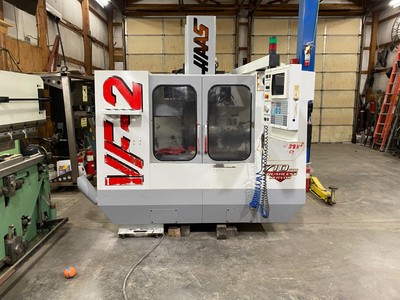 HAAS VF-2 CNC VERTICAL MACHINING CENTER  **VIDEO OF OPERATION IN DESRIPTION**