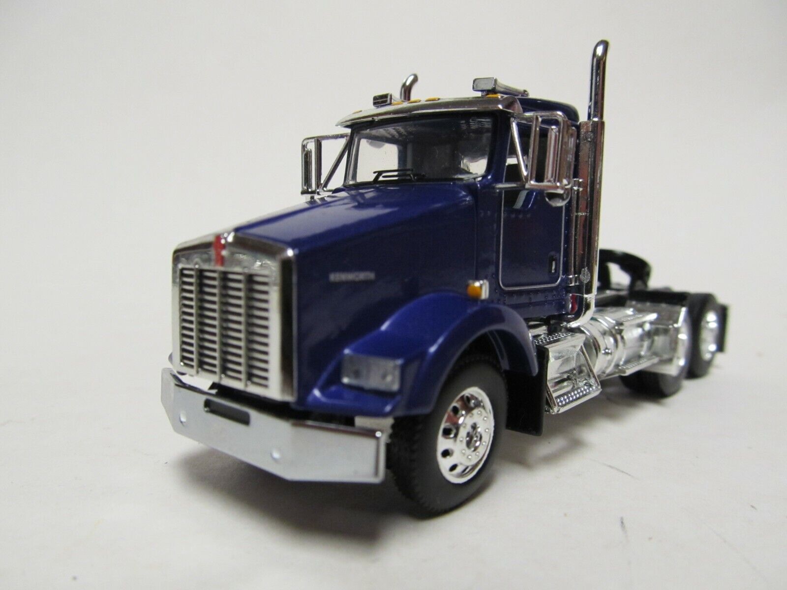 DCP / FIRST GEAR 1/64 SCALE T-800 KENWORTH DAY CAB, PURPLE & CHROME, RED ENGINE