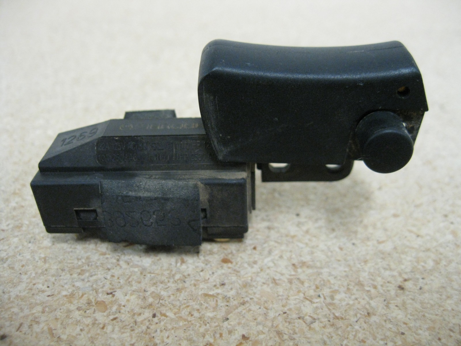 Dewalt DW840 Type 1 Replacement Trigger Switch.  613407-00 - Used, good.