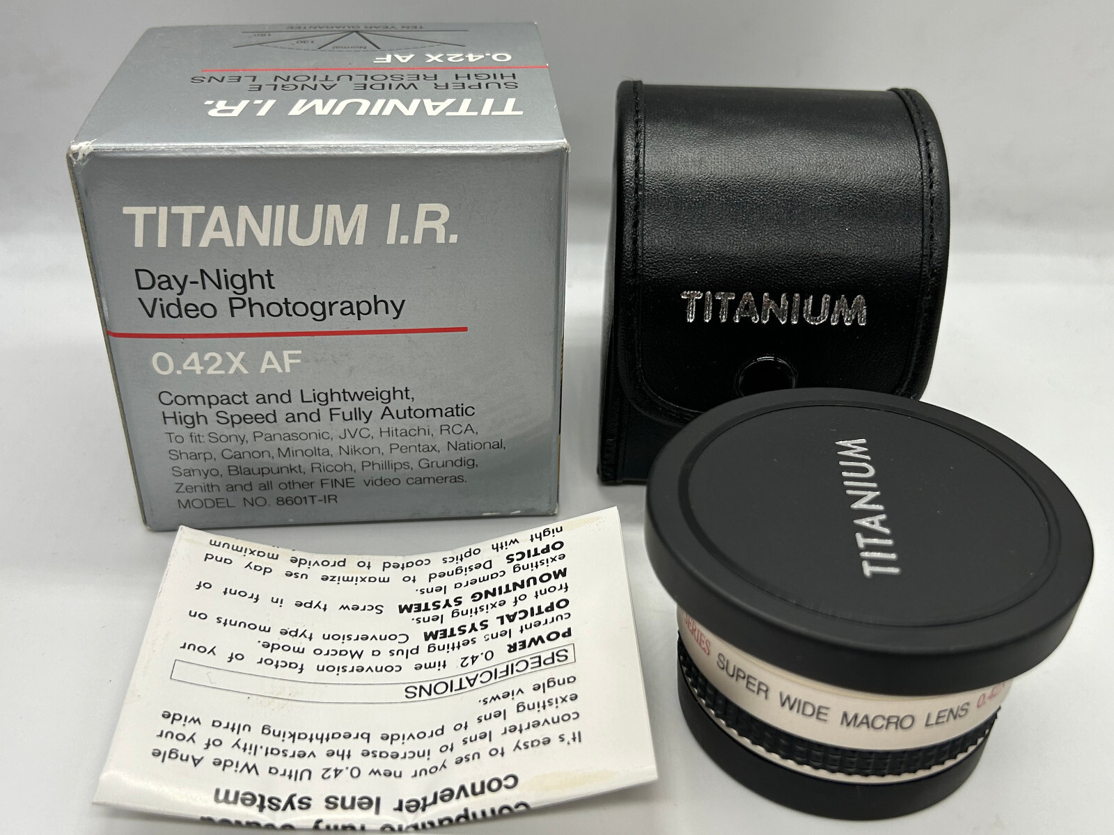 Titanium I.R. Series Super Wide AF 0.42X Lens For Canon, Minolta, Nikon, Olympus Titanium I.R. Series Super Wide AF 0.42X Lens For Canon, Minolta, Nikon, Olympus