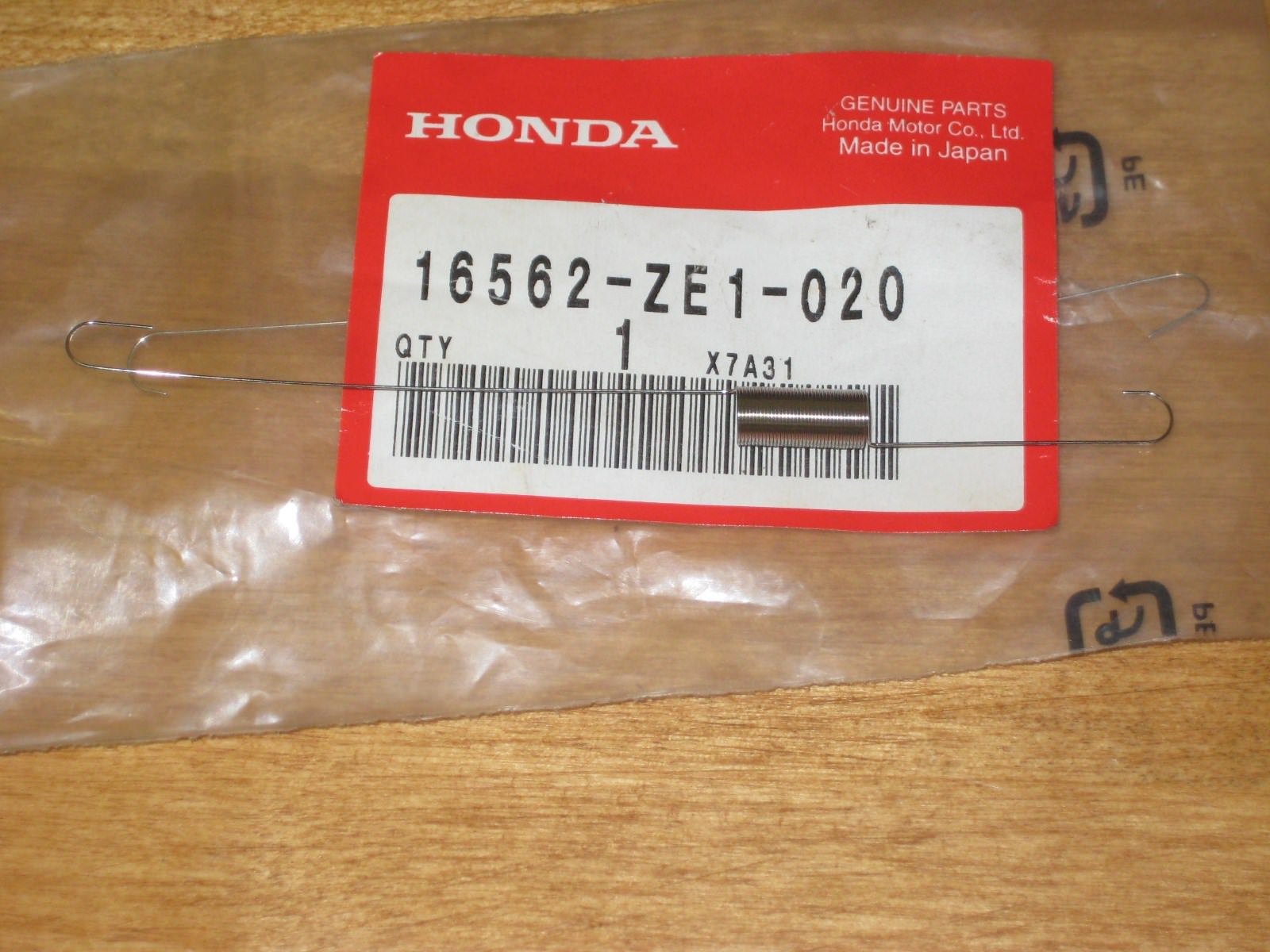 Genuine OEM Honda Part # 16562-ZE1-020 Throttle Return Spring. New !!!
