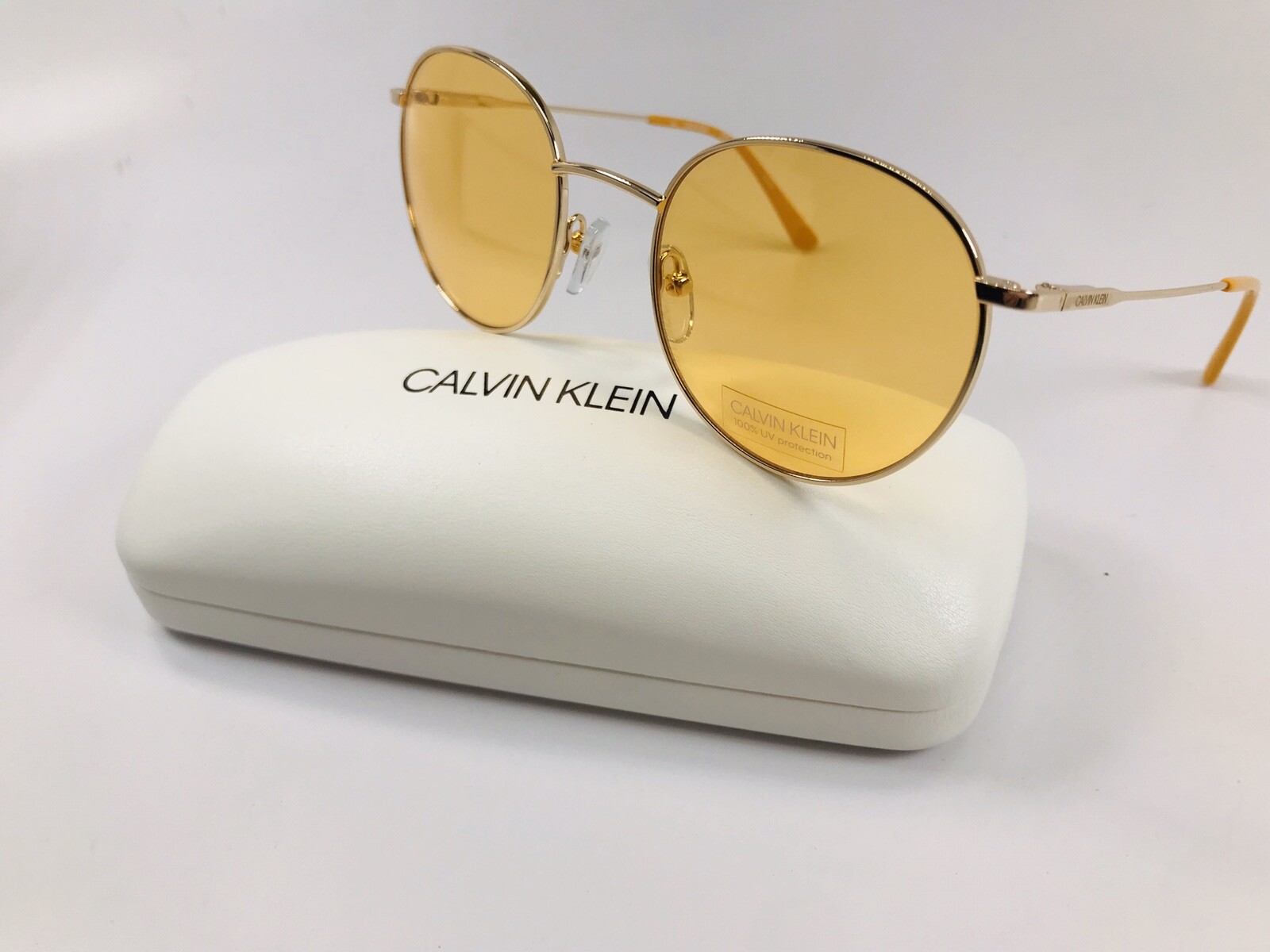 New Calvin Klein CK18104S 717 Round Gold & Maize Sunglasses