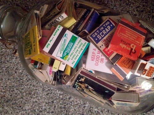 Antique Farmhouse clear glass jug filled with vintage matchbooks
