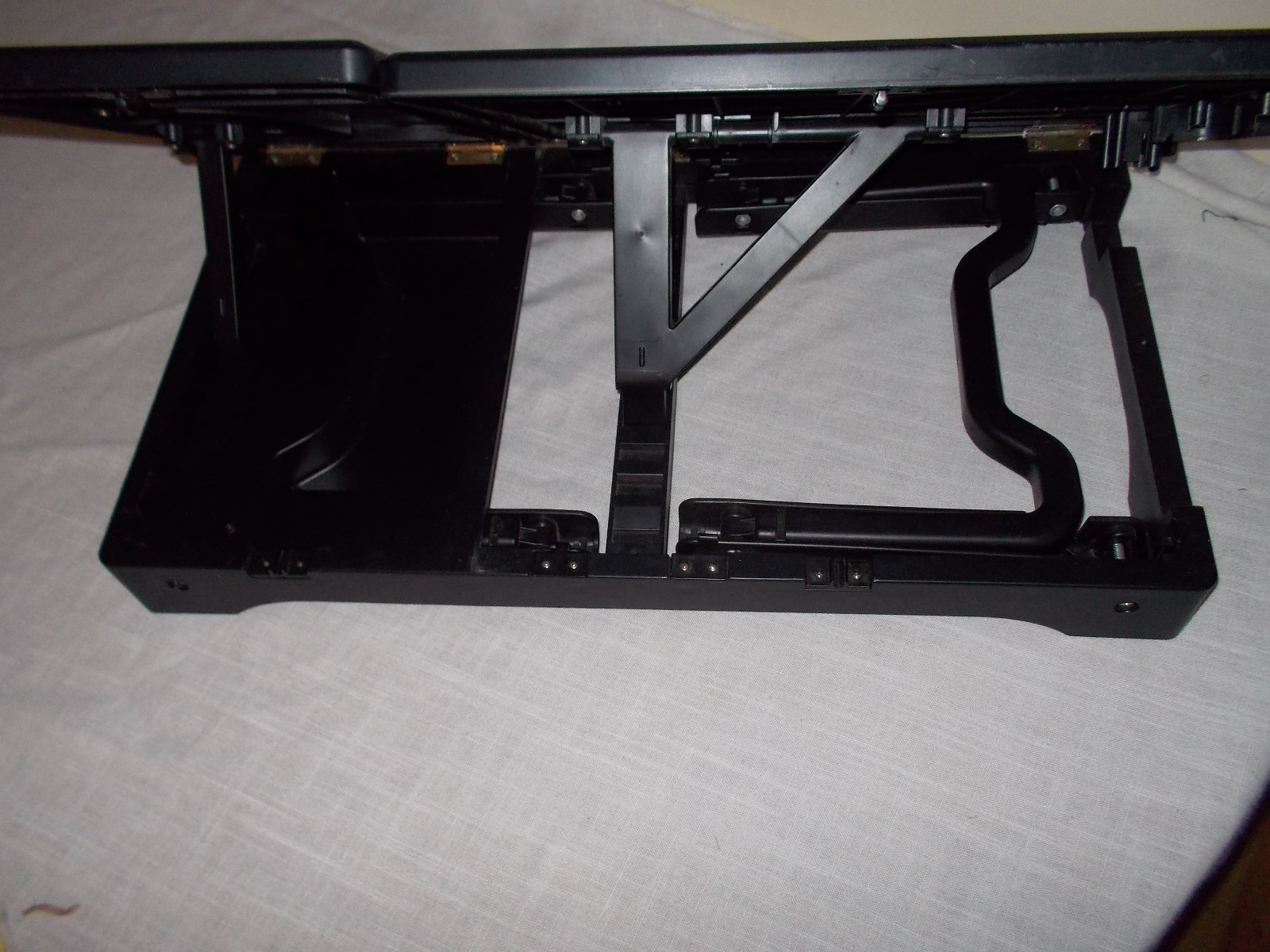 PORTABLE LAPTOP AND MOUSE HOLDER EACH SECTION IS ADJUSTABLE.